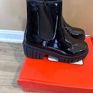 Black patent leather ankle boots